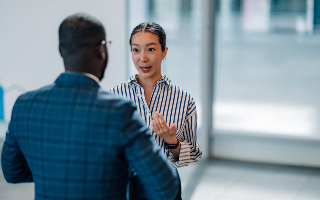 Business woman explaining strategy to colleague